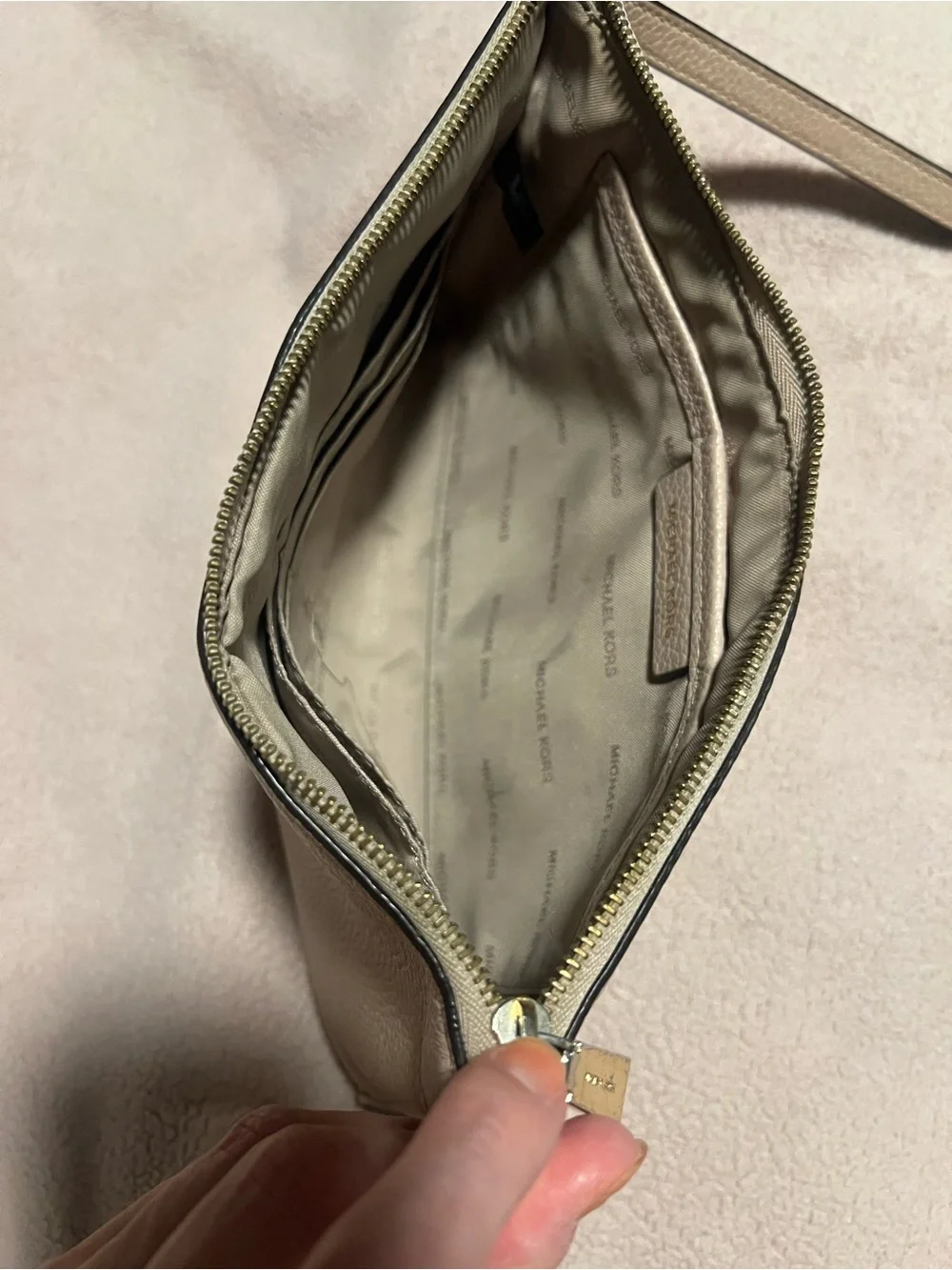 MICHAEL KORS Pebbled Leather Wristlet Clutch in blush pink